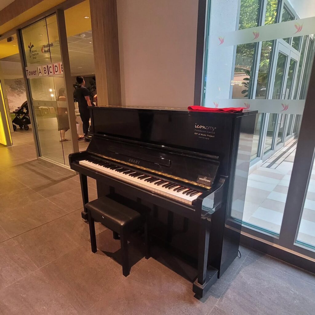 Iconomy Foundation Gift of Music public piano at Woodlands Health Campus
