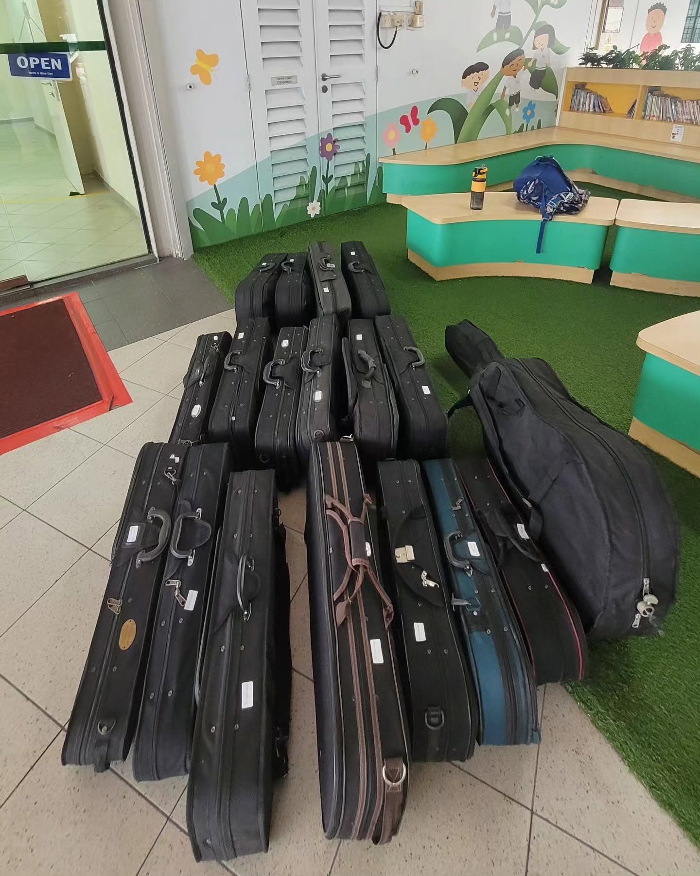 String instrument cases delivered through Iconomy Foundation's Gift of Music initiative